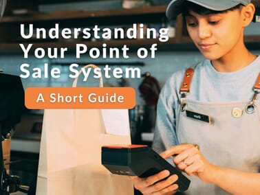 Restaurant employee using handheld POS terminal to process a takeout order