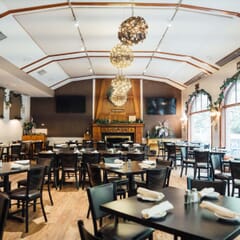 Fully Upholstered Stackable X-Back Metal Chair in Black