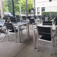 Stackable Outdoor Aluminum Chair with Black Synthetic Teak Wood Slats