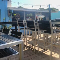 Indoor/Outdoor Brushed Aluminum Arm Bar Stool with Black Synthetic Teak Wood Slats