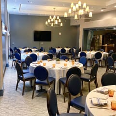 Elio Round Back Aluminum Stackable Banquet Chair