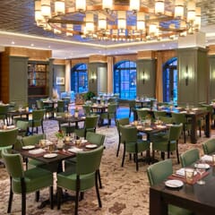 Fully Upholstered Custom Faux-Leather Restaurant Chair with Nailhead Trim