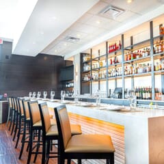 Fully Upholstered Black Wood Morgan Restaurant Bar Stool