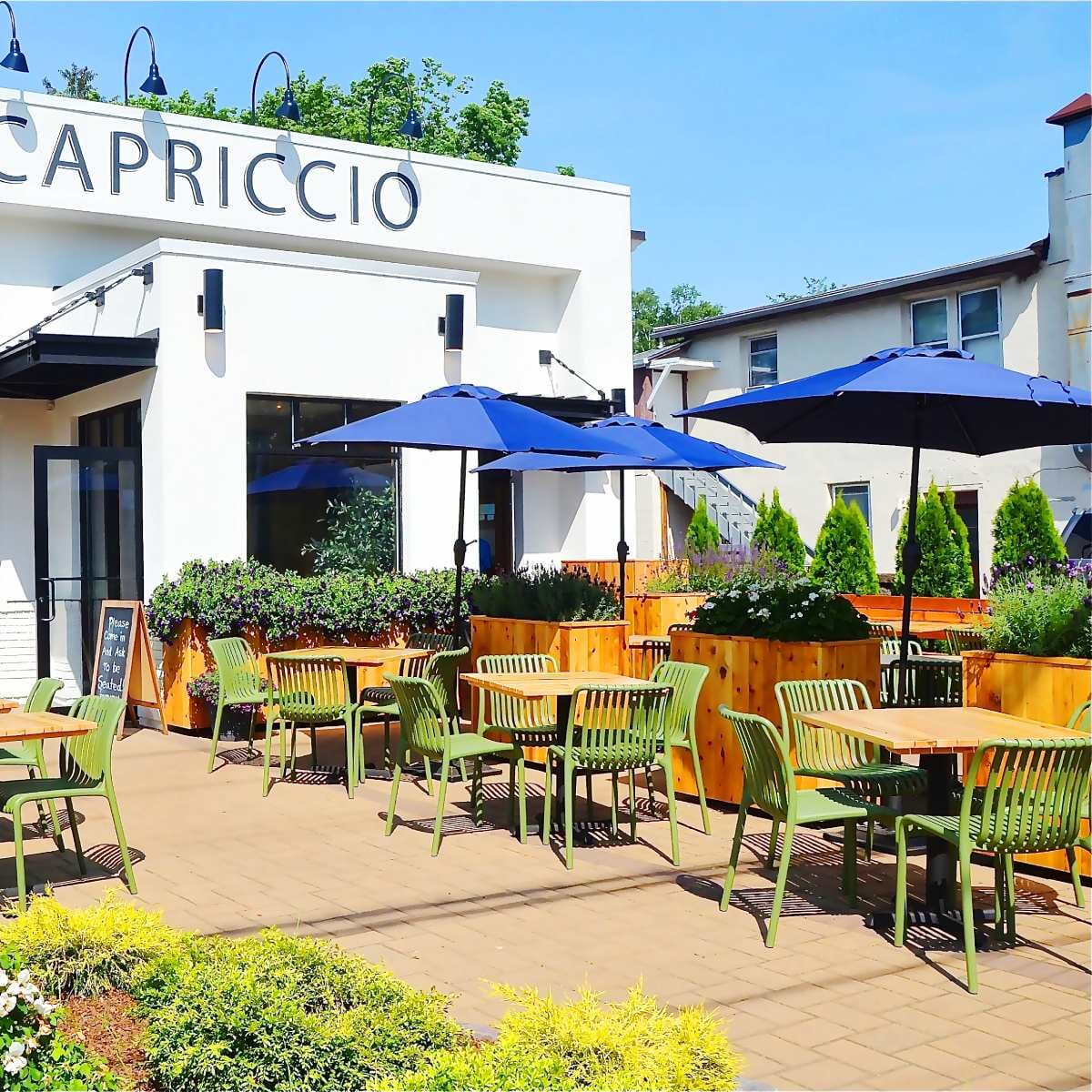 Stackable Indoor/Outdoor Resin Chair With Striped Seat and Back in Green