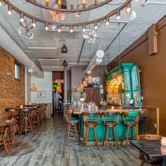 Captain's Mate Swivel Bar Stool in Walnut with Nailhead Trim