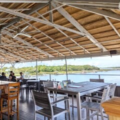 Indoor/Outdoor Aluminum Arm Bar Stool with Pewter Synthetic Teak Wood Slats