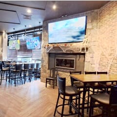 Quick-Ship Black Steel Restaurant Bar Stool with Black Vinyl