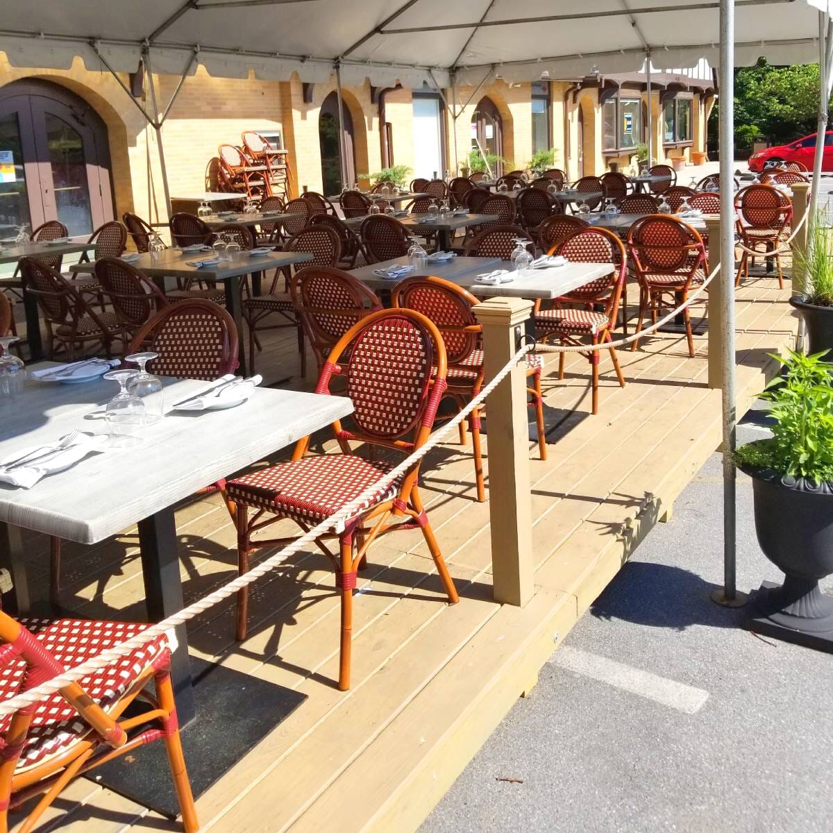 Synthetic Wicker & Bamboo Stackable Outdoor Chair with Rounded Back in Mahogany/Burgundy