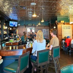 Fully Upholstered Solid Wood Schoolhouse Restaurant Swivel Bar Stool in Walnut