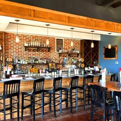 Solid Wood Schoolhouse Restaurant Bar Stool in Black