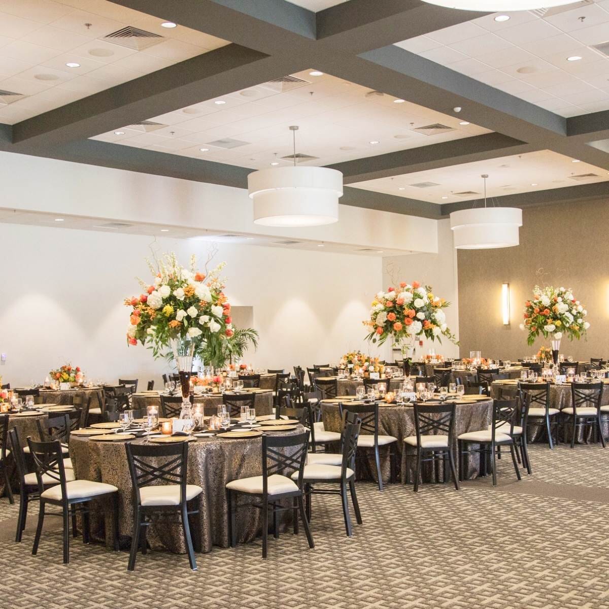 Stackable Black Metal X-Back Commercial Chair with Upholstered Seat