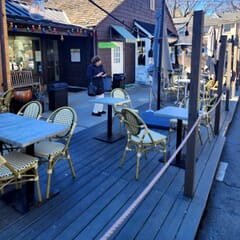 Synthetic Wicker & Bamboo Stackable Outdoor Restaurant Chair in Natural/Green