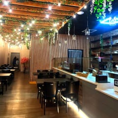 Chloe Solid Black Beech Wood Commercial Restaurant Chair With Upholstered Seat