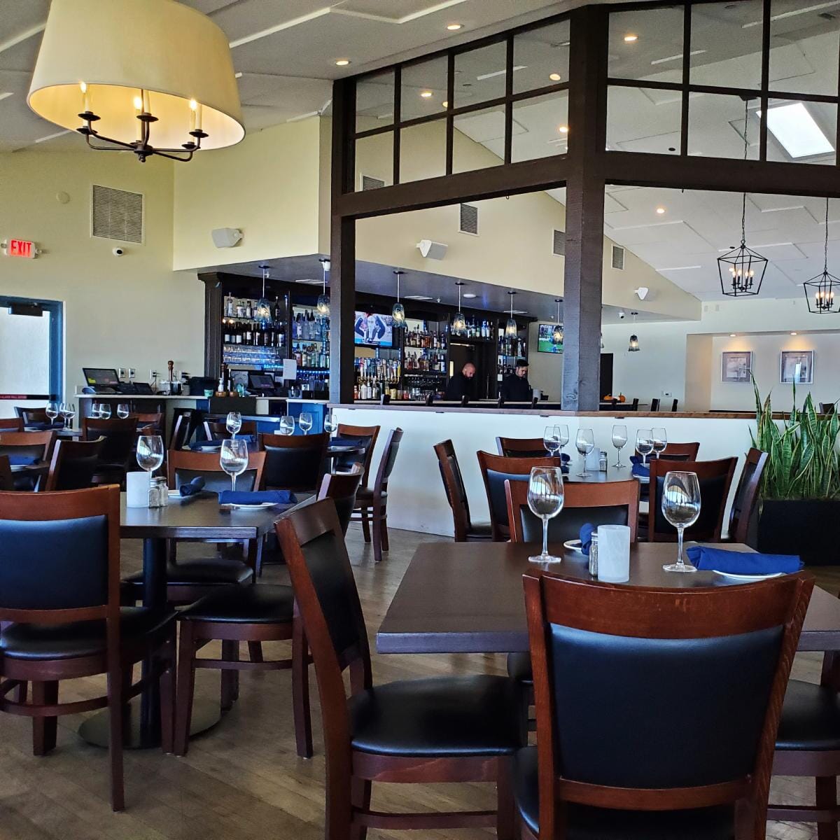 Walnut Wood Easton Quick Ship Restaurant Chair with Black Vinyl Seat & Back