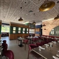 Ruby chairs with custom upholstery at Mumbai Central Indian Fare