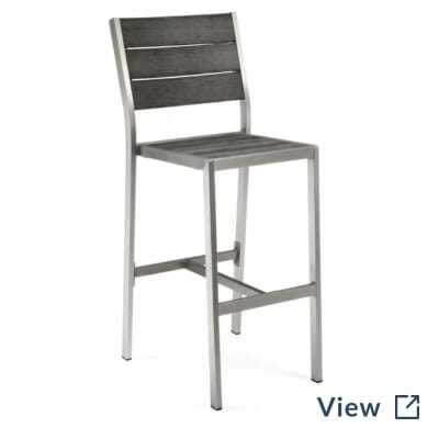 Outdoor aluminum commercial bar stool with pewter synthetic teak wood slats used for elevated seating at PopStroke Katy.