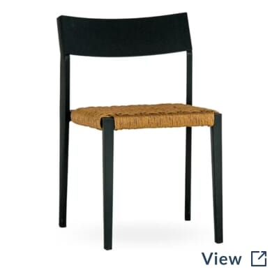 Stackable Isola restaurant chair with a tan rope seat, solid black back, and black aluminum frame.