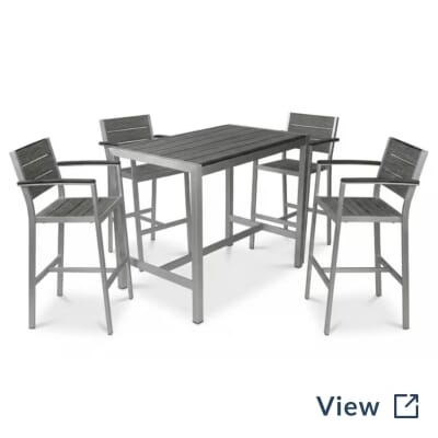 Brushed aluminum and synthetic teak commercial outdoor restaurant table and seating set used at PopStroke Katy.