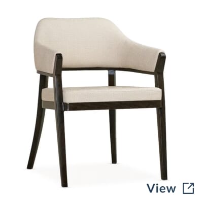 Whitman Aluminum Wood-Grain Upholstered Armchair with walnut frame, Traveler Chestnut seat, and Charlotte Sandstone patterned back.