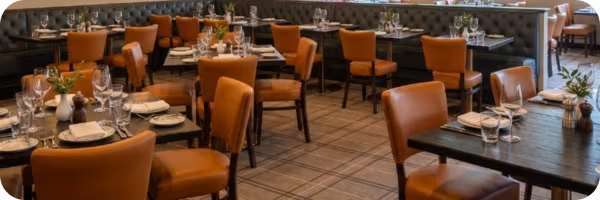 Restaurant interior featuring commercial seating