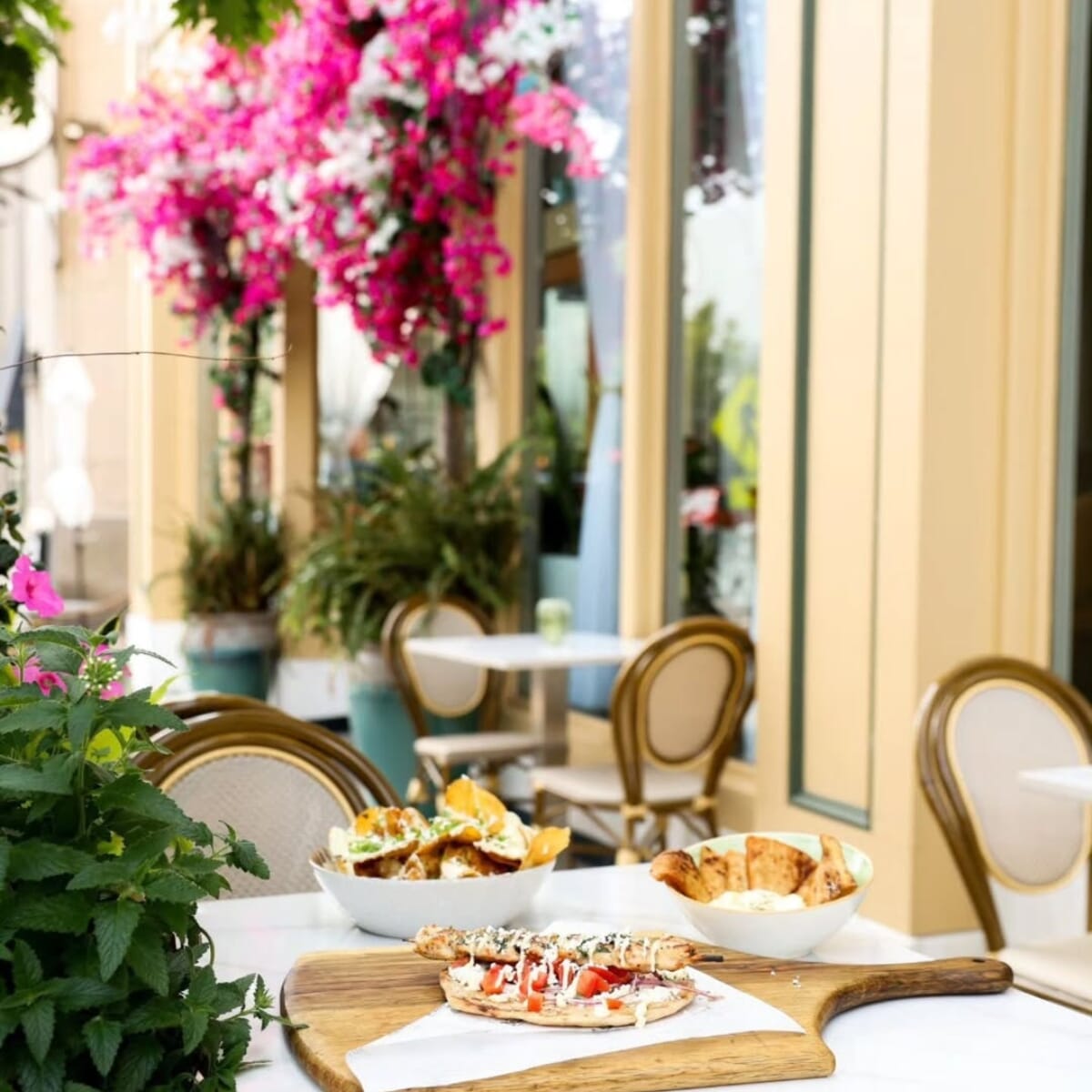 Exterior view and signage of Meli European Taverna in Easton, PA.