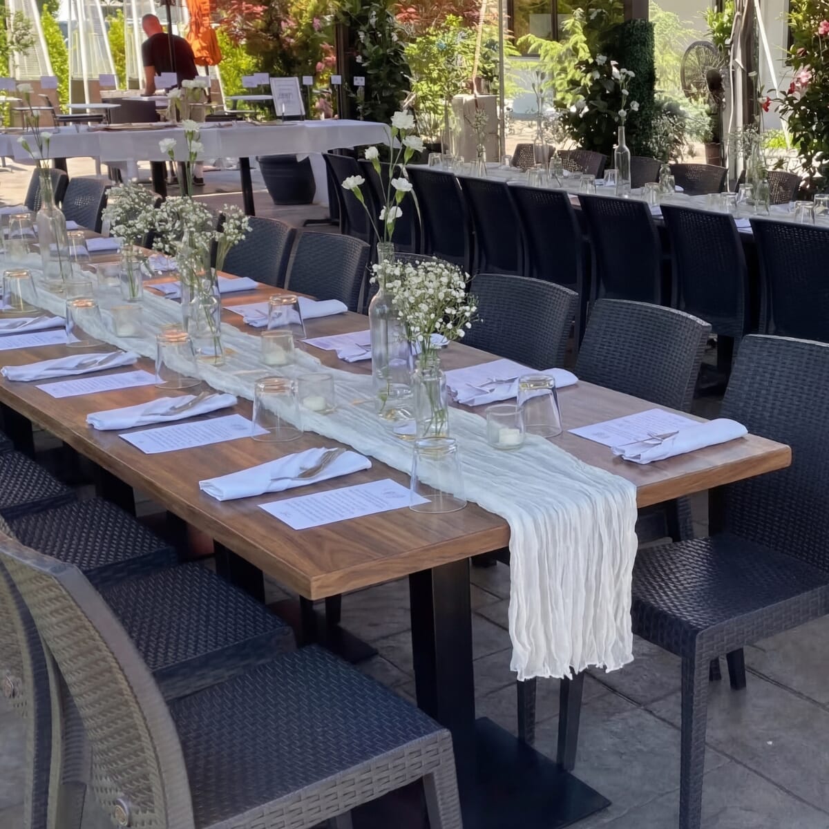 Square detail image of Villaggio Iccara tabletop and chair pairing.