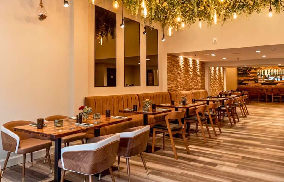 Elegant dining room at Fiorentini in Rutherford, NJ, highlighting artisanal Italian dishes and a rustic-modern design for an elevated trattoria experience.