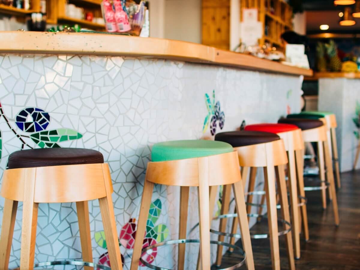 Backless and swivel bar stools at a full-service cantina bar