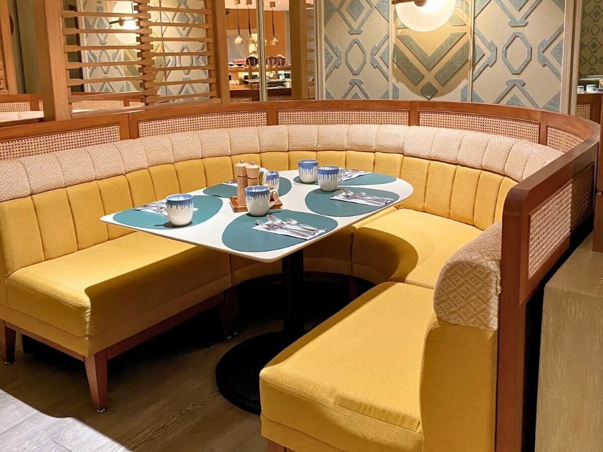 Channel-back restaurant booth with durable vinyl upholstery