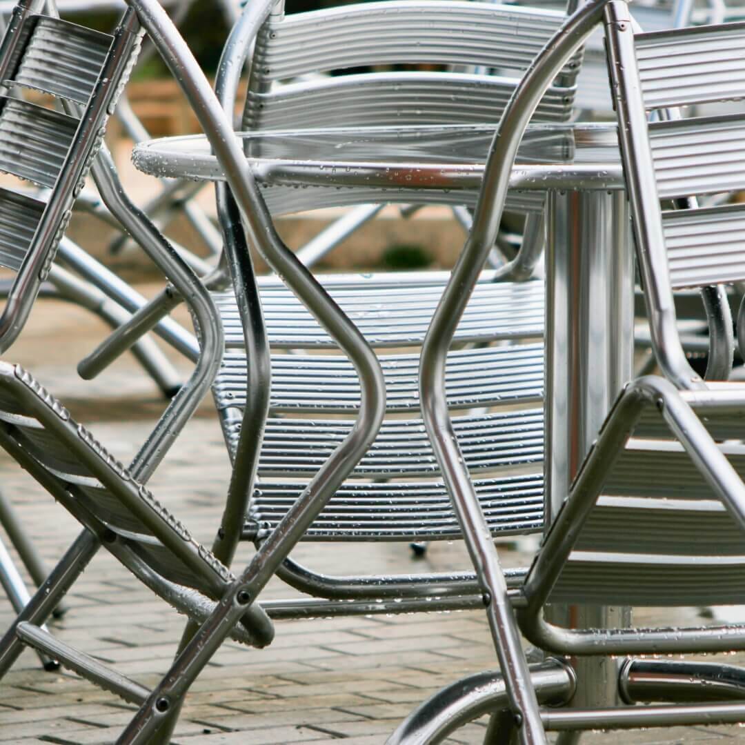 Powder-coated table base finish for high-traffic use