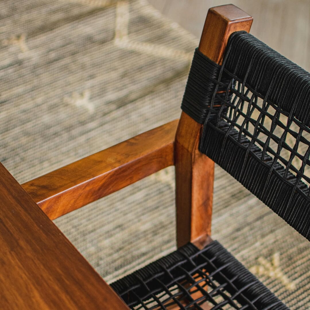 Handcrafted metalwork detail on a commercial chair frame