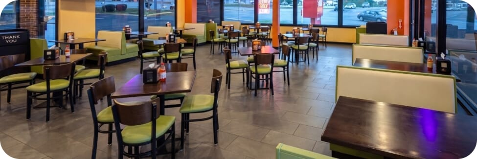 Restaurant interior featuring commercial seating