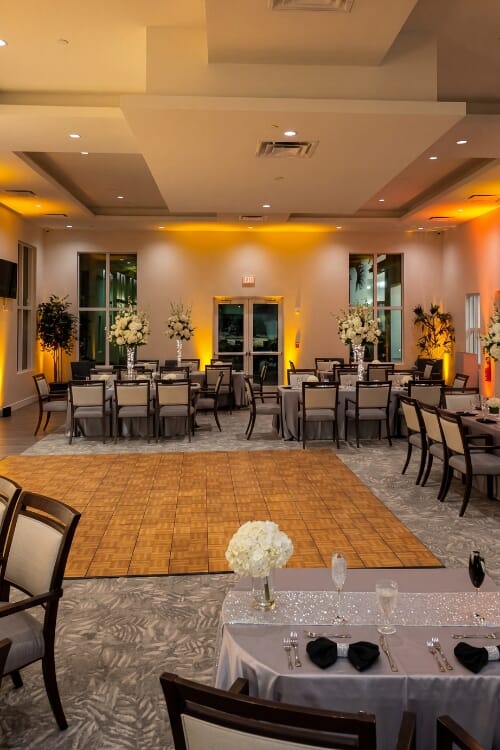 Single banquet chair detail showing custom upholstery and dark frame at Country Club of Coral Springs.