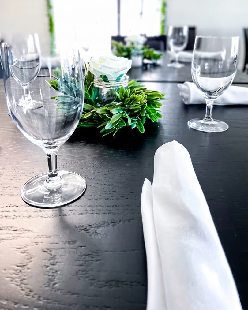 Branches Catering bar and event space featuring upholstered Morgan commercial bar stools, black table bases, and coordinated wedding and banquet furniture.