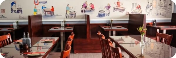 Restaurant interior featuring commercial seating
