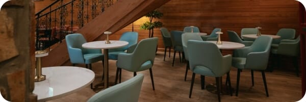 Restaurant interior featuring commercial seating