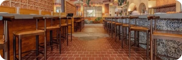 Restaurant interior featuring commercial seating