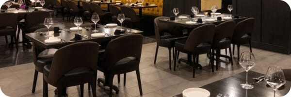 Restaurant interior featuring commercial seating