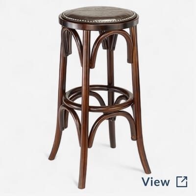 Bistro style backless commercial bar stool in antique walnut at Vida Verde main bar