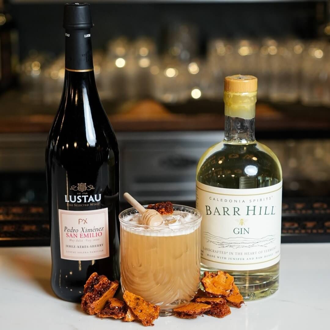Barr Hill gin, PX sherry and honeycomb cocktail on marble bar at Strickland’s Steakhouse.
