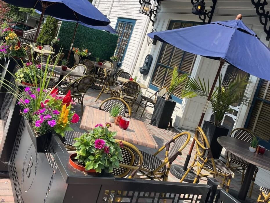 Outdoor of The Blue Shutters restaurant featuring outdoor restaurant chairs