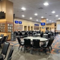 Hospitality seating setup with black banquet chairs at UF